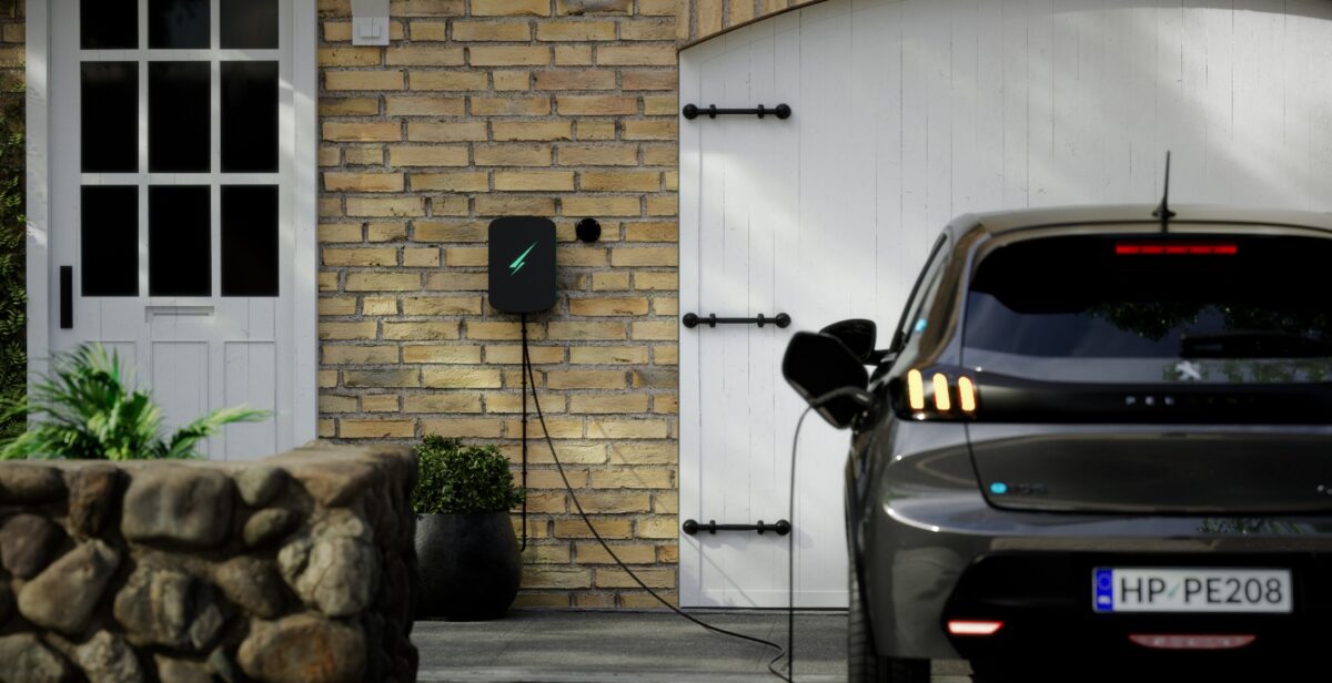 Professionally installed smart EV charger on a modern home exterior